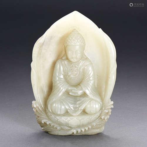 A CHINESE WHITE JADE CARVING OF BUDDHIST FIGURE