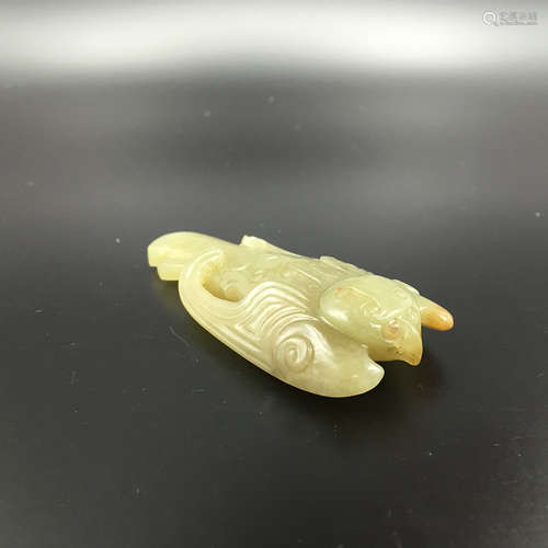 A CHINESE JADE MYTHICAL BIRD, GARUDA PENDANT