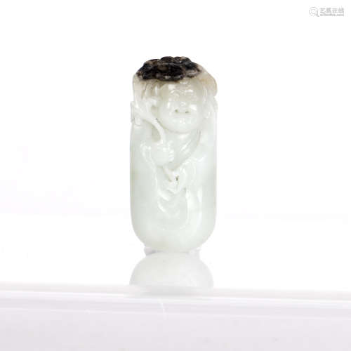 A WHITE JADE CARVED OF FIGURE