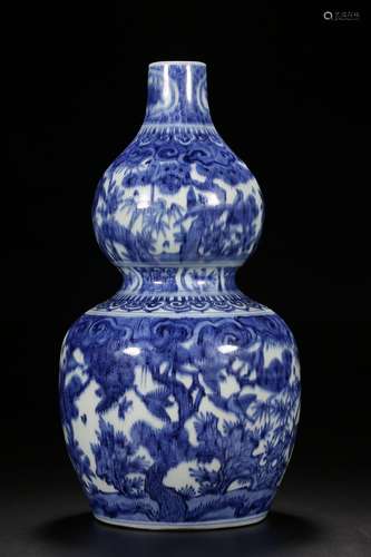 A BLUE AND WHITE DOUBLE GOURD-FORM VASE 