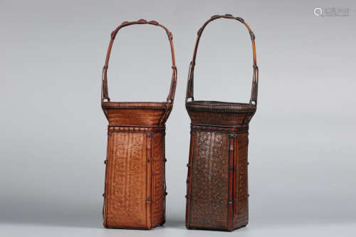 A SET OF TWO BAMBOO BASKET WITH HANDLE