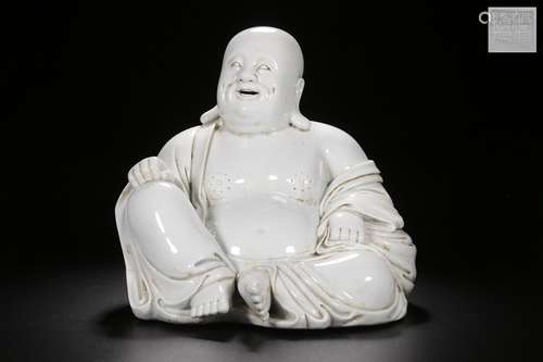 A CHINESE DEHUA BLANC-DE-CHINE FIGURE OF BUDAI 