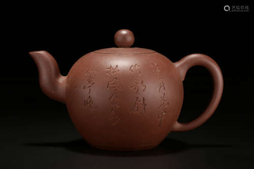 A CHINESE ZISHA TEAPOT WITH LID