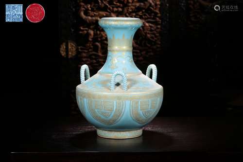 A BLUE-GLAZED PORCELAIN ZUN VASE