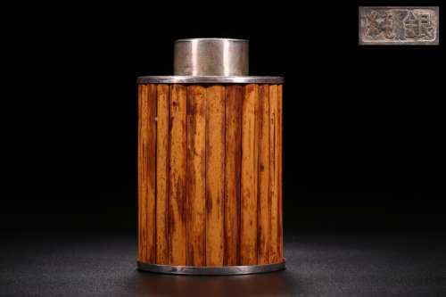 A SILVER TEA CANISTER EMBEDDED WITH BAMBOO STRIPS WITH COVER