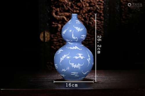 A BLUE-GLAZED DOUBLE-GOURD PORCELAIN VASE