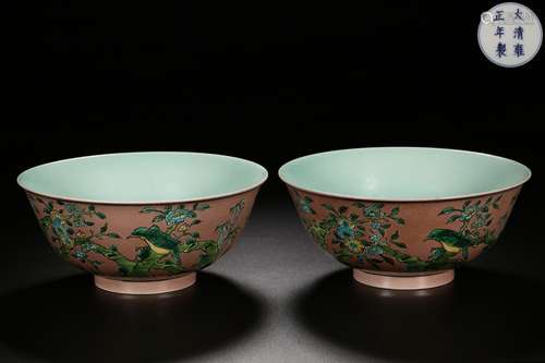 A PAIR OF PINK GROUND ENAMELLED BOWLS