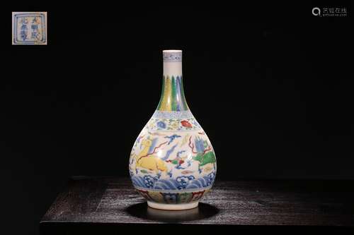 A CHINESE DOUCAI AND BLUE AND WHITE PORCELAIN VASE