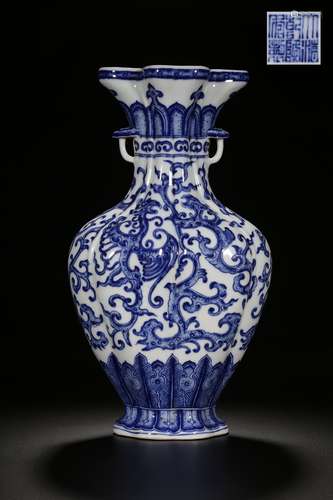 AN UNUSUAL BLUE AND WHITE PHOENIX FOILAGE VASE