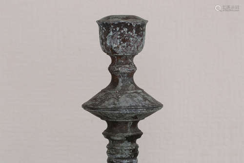 A PAIR OF LONG BRONZE CANDLE HOLDER WITH OPENWORK CARVED BASE