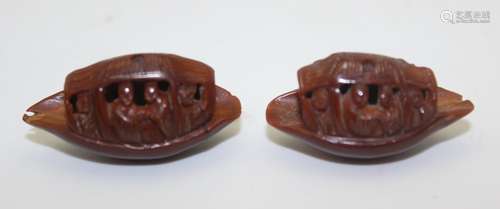 PAIR OF ANTIQUE OLIVE NUT CARVING, SIGNED.