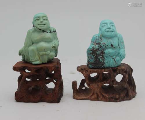 TURQUOISE CARVED BUDDAH WITHWOOD BASE