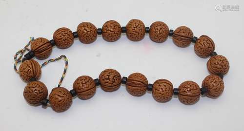 PEACH SEED PRAYER BEADS