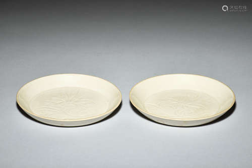 PAIR OF WHITE GLAZED AND CARVED DISHES