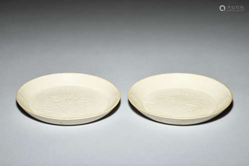 PAIR OF WHITE GLAZED AND CARVED DISHES