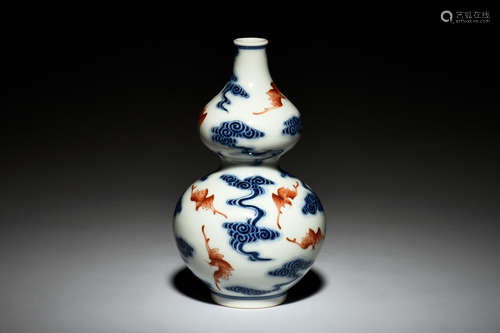 BLUE AND WHITE UNDERGLAZED RED VASE