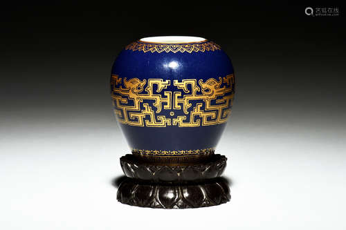 A SMALL GILTED BLUE-GLAZED JAR