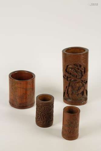 A GROUP OF FOUR CHINESE CARVED BAMBOO BRUSH POTS 'BITONG'