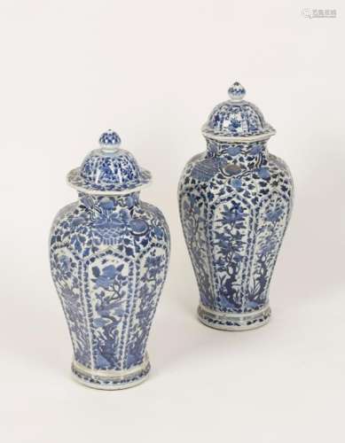A PAIR OF CHINESE OCTAGONAL PANELLED BLUE AND WHITE VASES