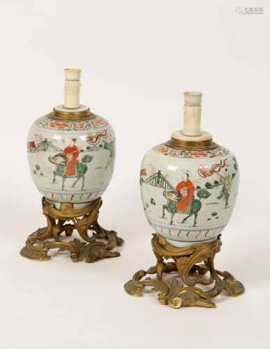 A PAIR OF CHINESE FAMILLE VERTE PORCELAIN OVOID JARS