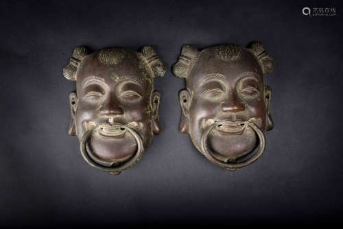 A Pair of Bronze Fairy Mask