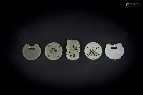 A Group of Five Reticulated Jade Pendants