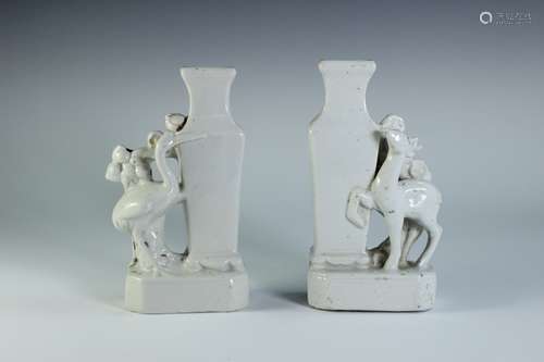 A PAIR OF WHITE GLAZED VASE