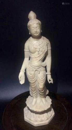 A WHITE STONE BUDDHA