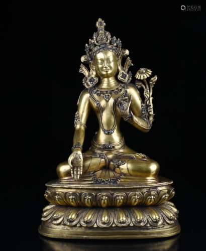 A GILT BRONZE GUANYIN FIGURE