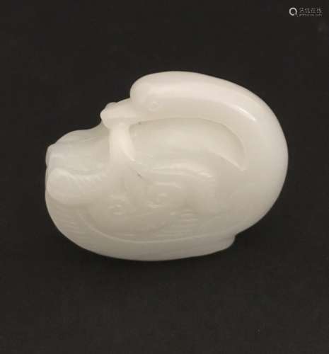 A CARVED JADE DUCK