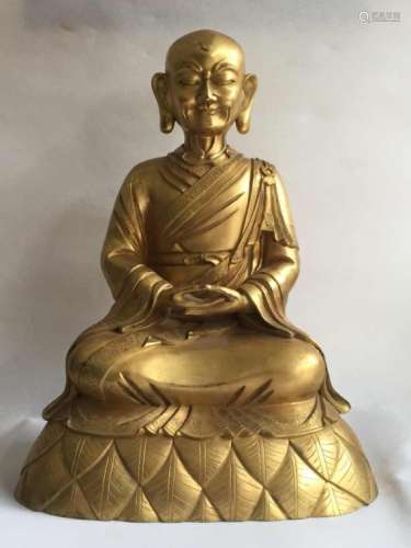 A GILT BRONZE BUDDHA