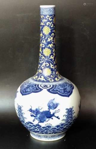 KANGXI MARK, A BLUE AND YELLOW BOTTLE VASE