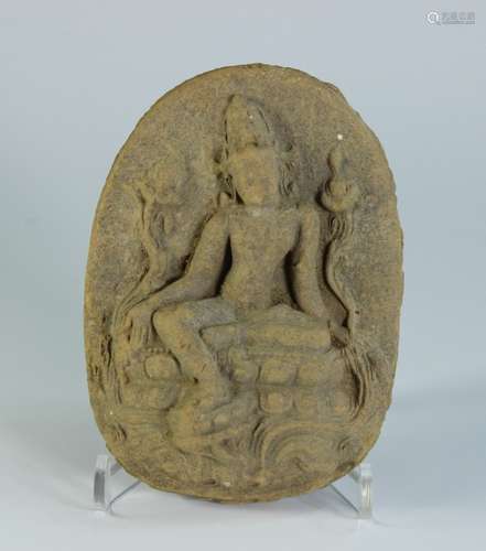 A CARVING STONE BUDDHA