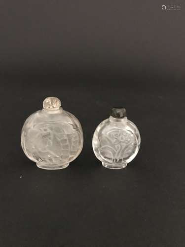 A PAIR OF CRYSTAL SNUFF BOTTLES