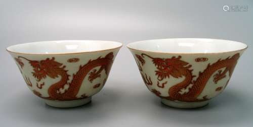 Pair Chinese iron red porcelain dragon bowls, Daoguang