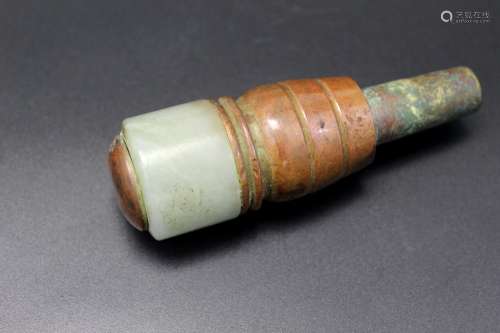 Chinese bronze cane handle made with a jade thumb ring.