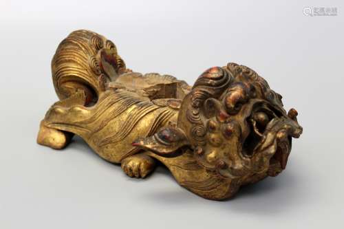 Chinese carved wood stand of a fu dog