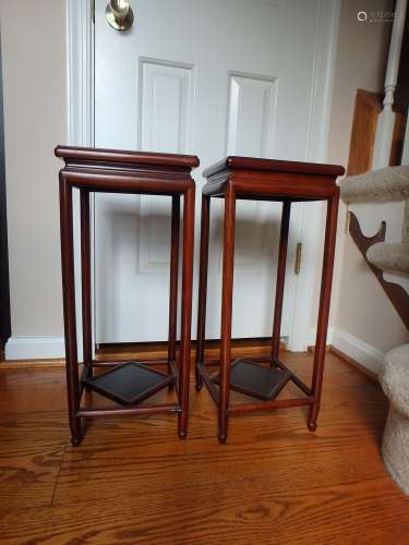 Pair Chinese rosewood plant stands.