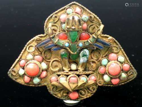 Coral and  precious stone inlaid metal brooch.