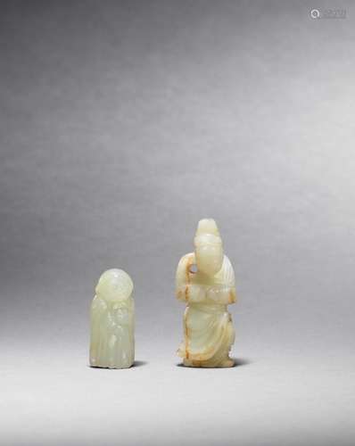 A white jade figure of an official, and a white jade figure of a foreigner