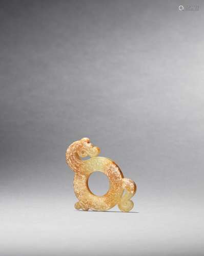 A yellow jade 'dragon' ring