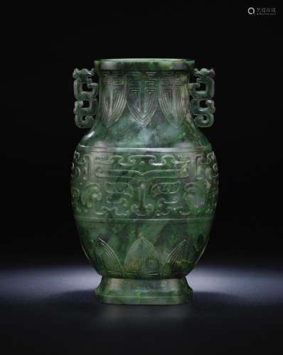 A rare spinach-green jade archaistic baluster vase, hu