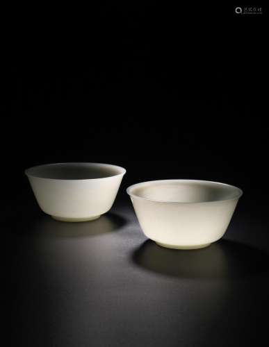 An exceptional pair of Imperial white jade bowls