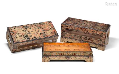 A very rare pair of Imperial polychrome and qiangjin lacquer 'dragon' banquet boxes and covers
