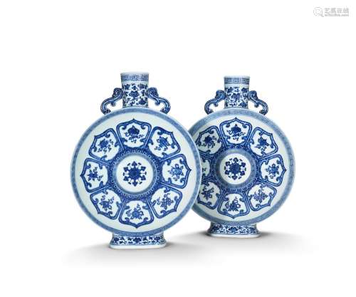 An exceptionally rare pair of Imperial blue and white 'Bajixiang' moonflasks, bianhu