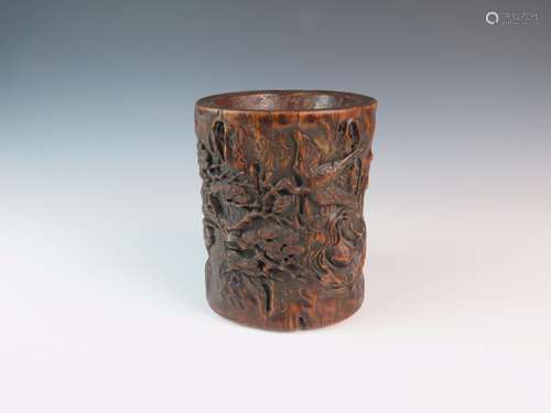 A CARVED WOOD BRUSHPOT