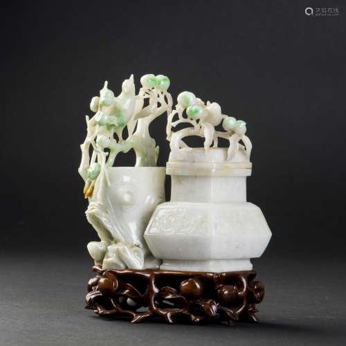 A COMPOSED GROUP OF TWO JADEITE VASES AND COVERS