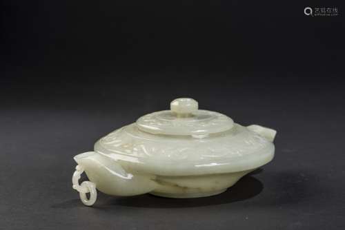 A GREENISH-WHITE JADE TEAPOT AND COVER