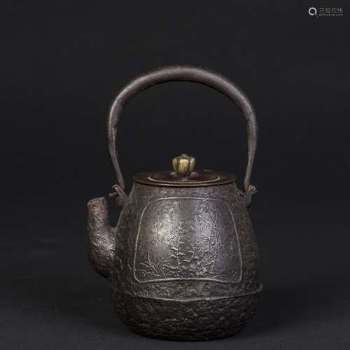 A JAPANESE TETSUBIN CAST IRON TEAPOT