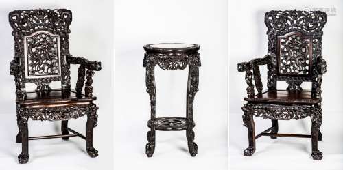 A SET OF CARVED HARDWOOD OR ZITAN ARMCHAIRS WITH A STAND